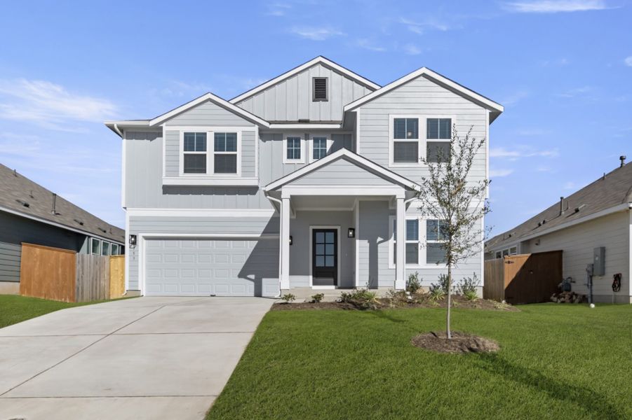 Front exterior of a new home in Orchard Ridge, Liberty Hill, TX, highlighting curb appeal (Image 29).