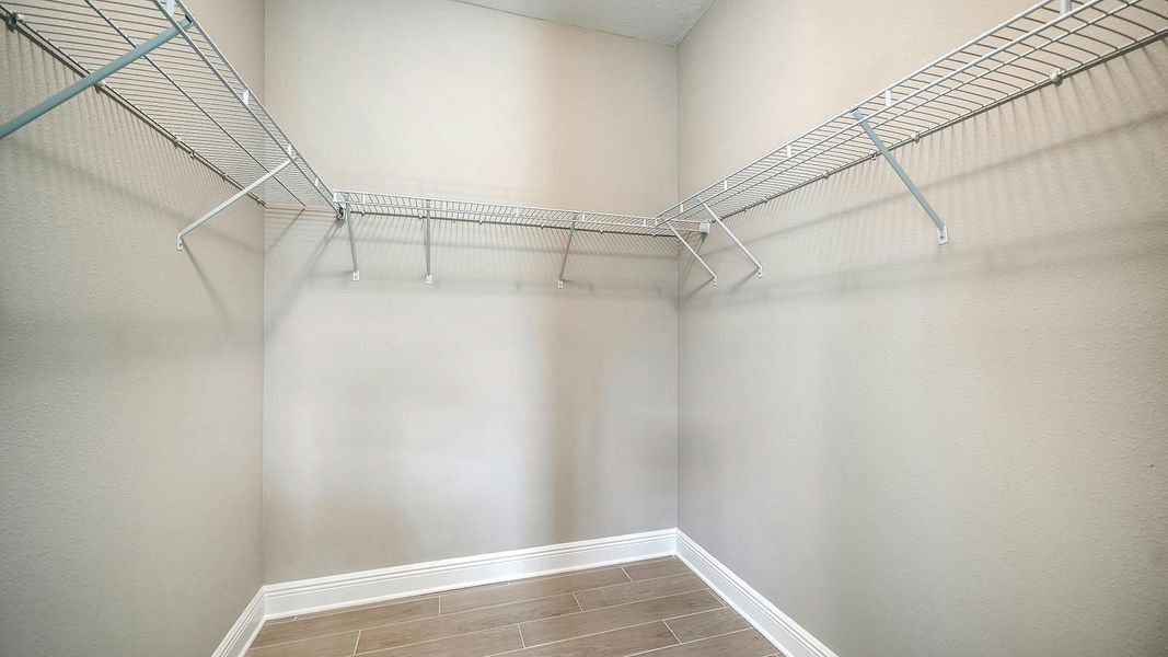 Spacious, unfurnished interior of a new home in Vicenza Real Estate and Homes for Sale in North Venice, FL - Neal Communities, Venice (Image 29).