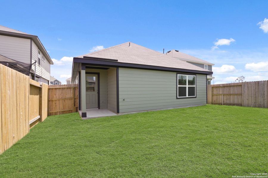 Front exterior of a new home in Timber Creek, San Antonio, TX, highlighting curb appeal (Image 2).