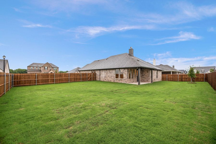 Exterior details and patio area of a home in Aero Vista, Caddo Mills (Image 31).