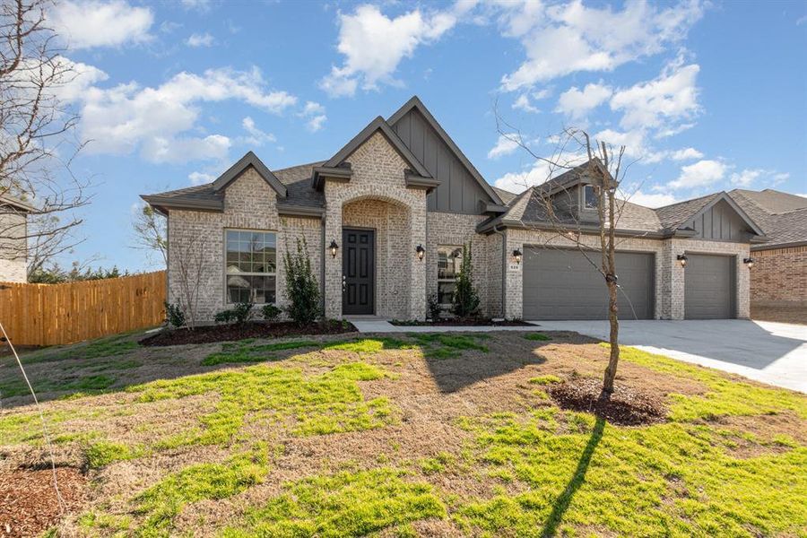 Front exterior of a new home in Cole Crossing Estates, DeSoto, TX, highlighting curb appeal (Image 19).
