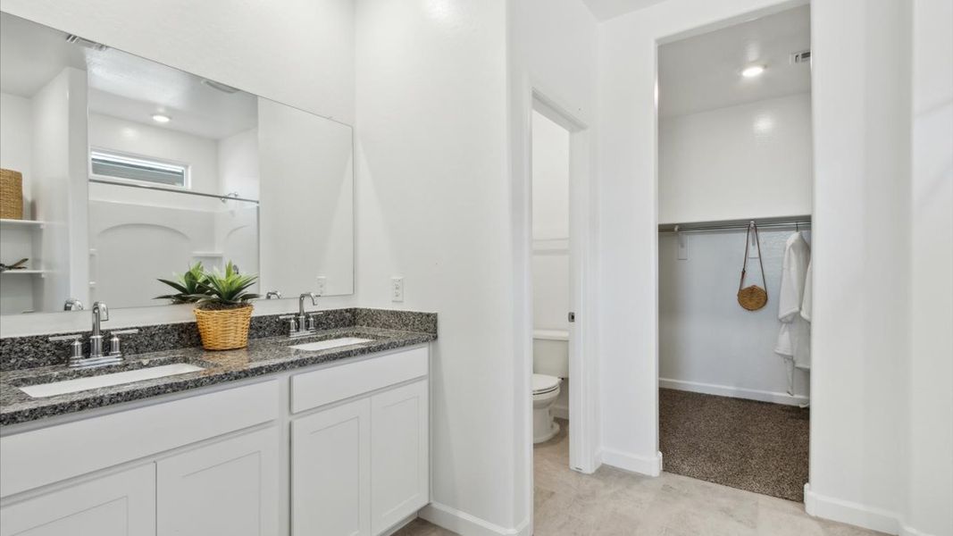 Representative furnished interior of a home built from the Justin by D.R. Horton in Sorrento, Maricopa (Image 24).