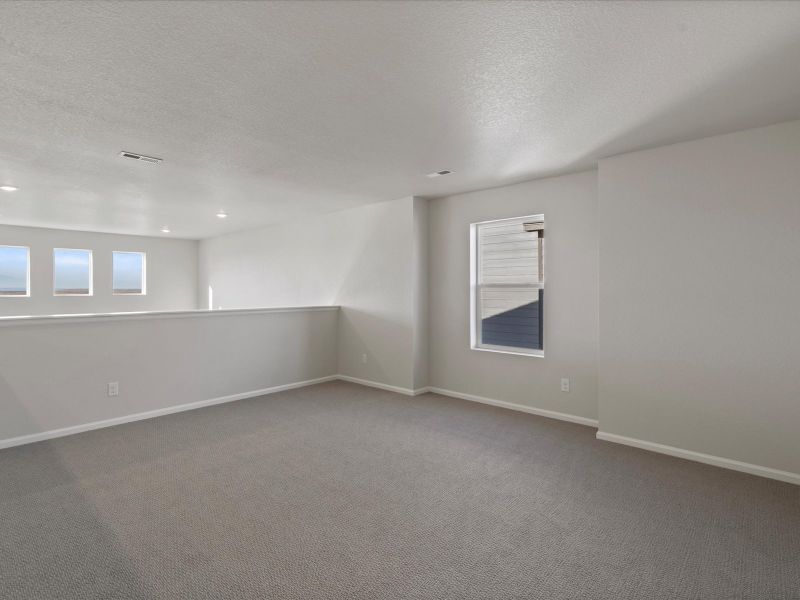 Spacious, unfurnished interior of a new home in Buffalo Highlands: The Canyon Collection, Commerce City (Image 6).