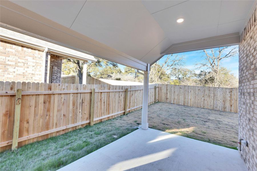 Exterior details and patio area of a home in Retreat at San Gabriel, Georgetown (Image 2). Exterior details and patio area of a home in Retreat at San Gabriel, Georgetown (Image 2).