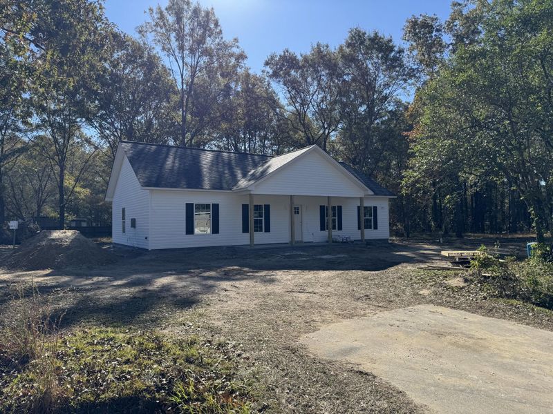 Exterior details and patio area of a home in , Cottageville (Image 14).