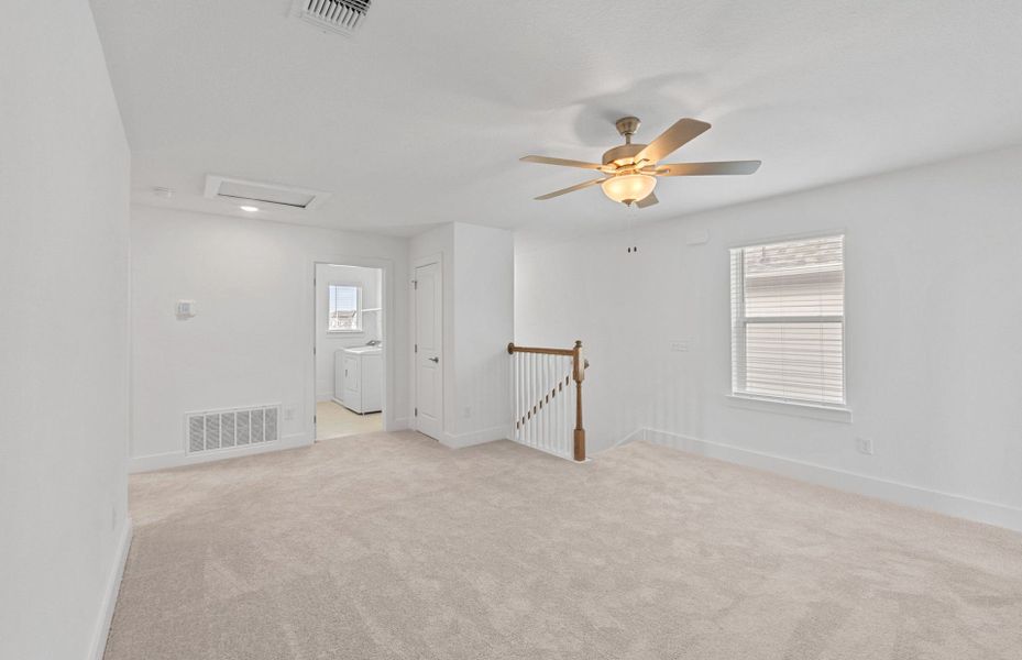 Spacious, unfurnished interior of a new home in Crosswinds, Kyle (Image 28).