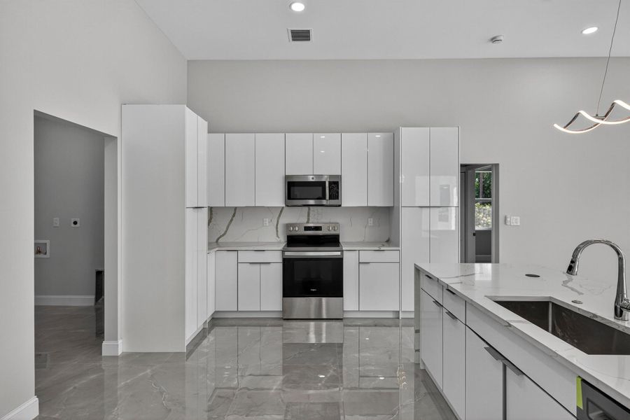 Furnished interior view inside a new home in , The Acreage (Image 37). Furnished interior view inside a new home in , The Acreage (Image 37).