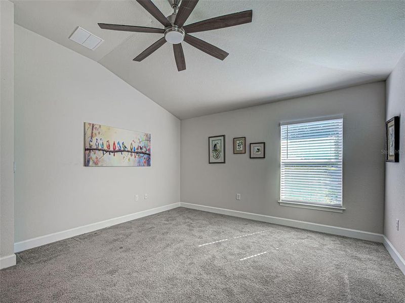 Spacious, unfurnished interior of a new home in Watercress Cove, North Port (Image 21).