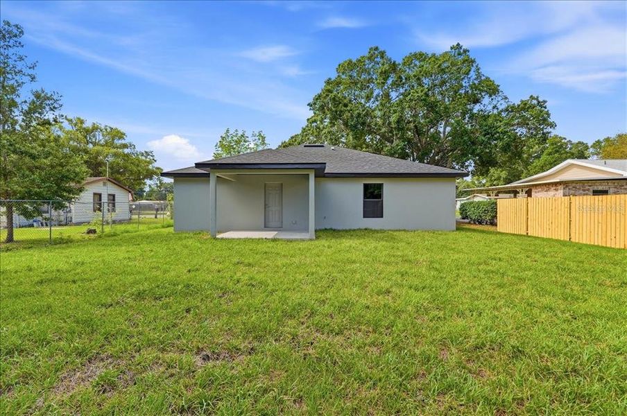 Exterior details and patio area of a home in , Auburndale (Image 34).