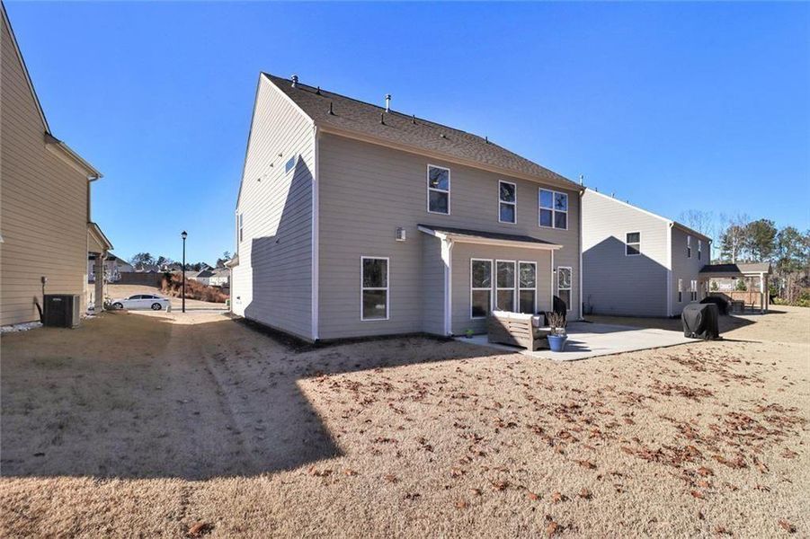 Exterior details and patio area of a home in Pinebrook at Hamilton Mill, Auburn (Image 26). Exterior details and patio area of a home in Pinebrook at Hamilton Mill, Auburn (Image 26).
