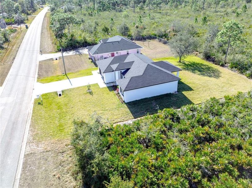 Front exterior of a new home in , Sebring, FL, highlighting curb appeal (Image 27).
