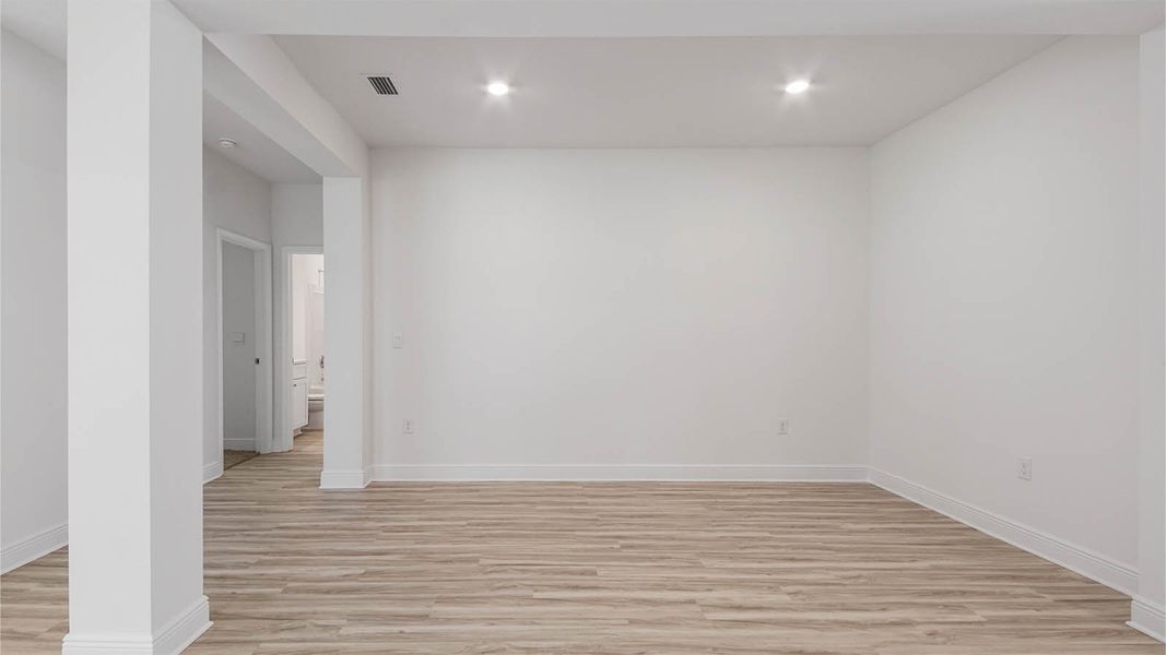 Representative unfurnished interior of a home built from the Kennedy by D.R. Horton in Bayside at Ward Creek, Panama City Beach (Image 21).