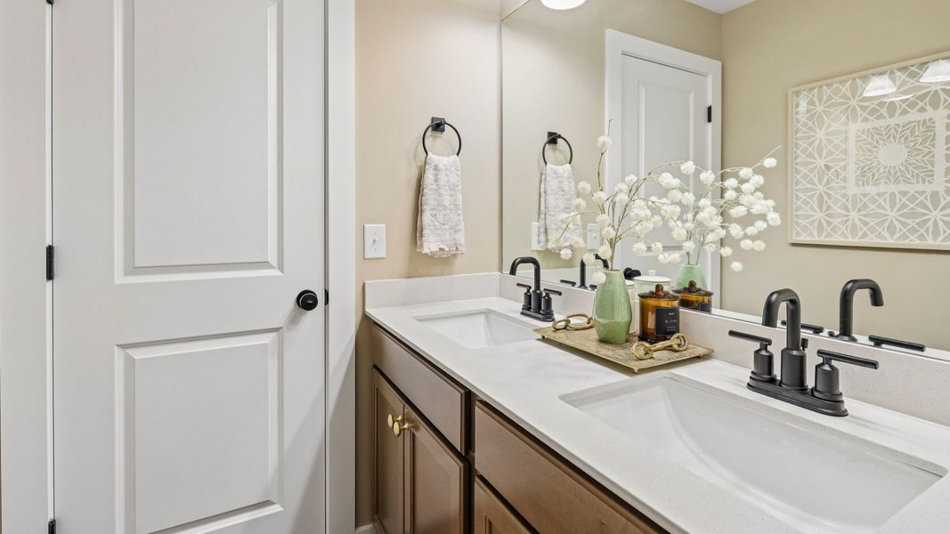 Secondary bathroom with dual vanity Secondary bathroom with dual vanity