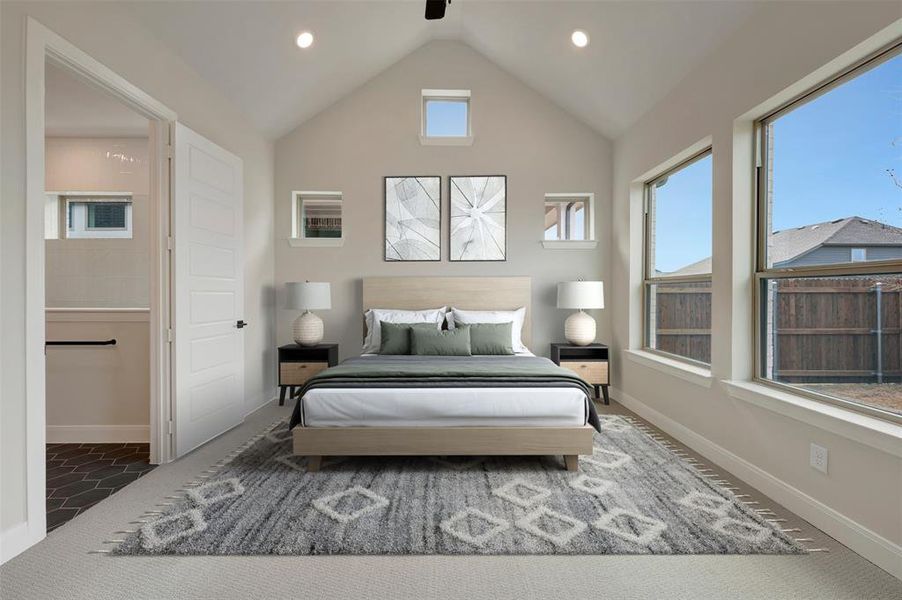 Carpeted bedroom with multiple windows, ceiling fan, and recessed lighting