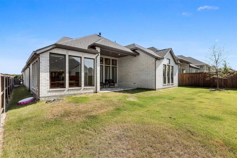 Front exterior of a new home in , Lavon, TX, highlighting curb appeal (Image 2). Front exterior of a new home in , Lavon, TX, highlighting curb appeal (Image 2).