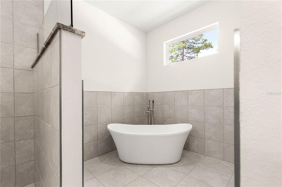 Furnished interior view inside a new home in , Dunnellon (Image 8).