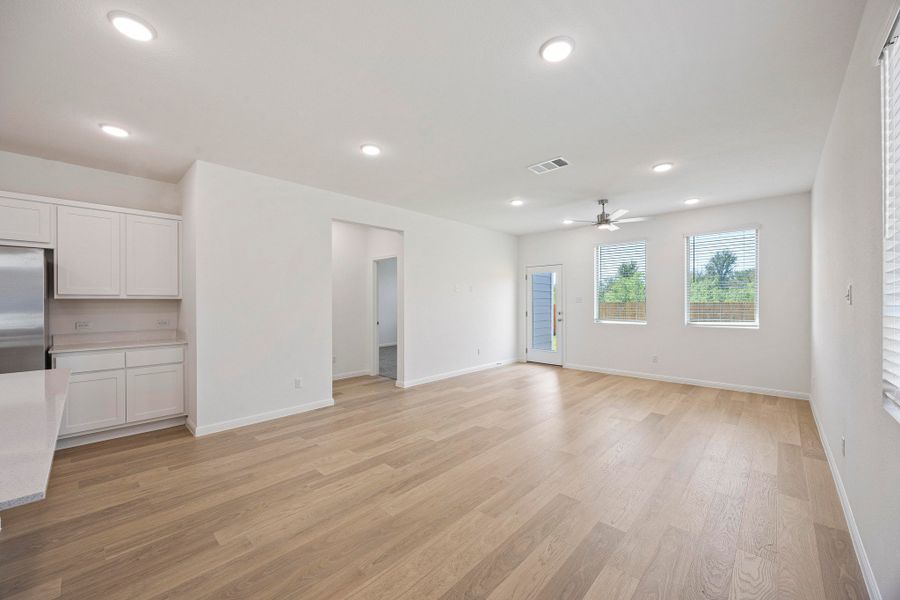 Dining and Living Area in the Magnolia home plan by Trophy Signature Homes – REPRESENTATIVE PHOTO