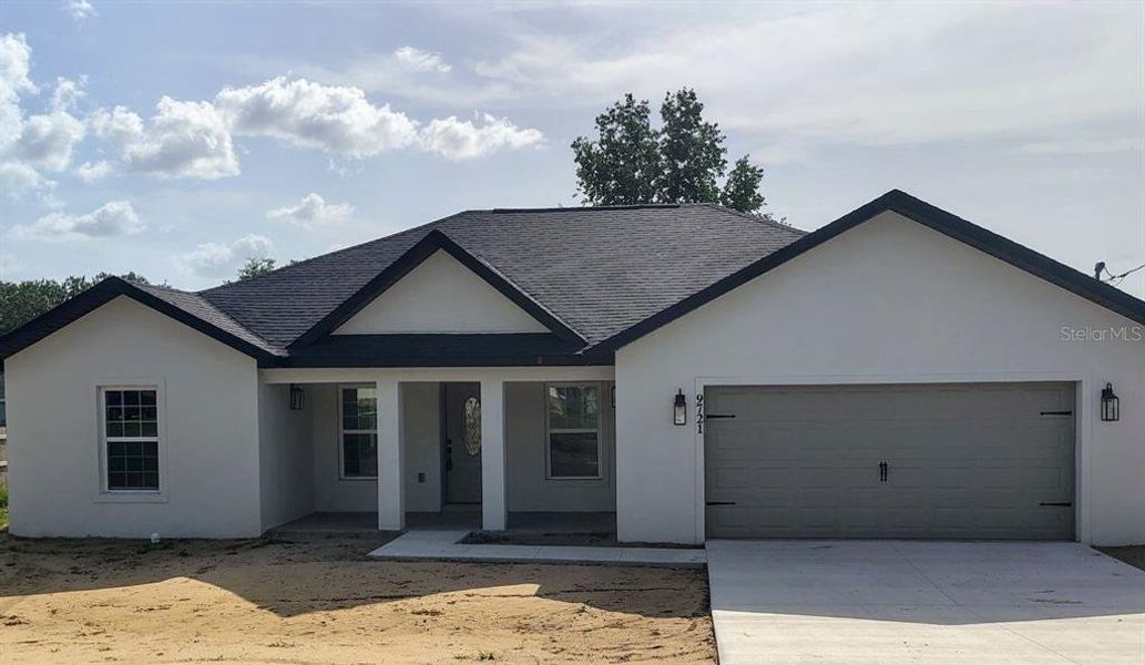 Front exterior of a new home in , Ocala, FL, highlighting curb appeal (Image 2).