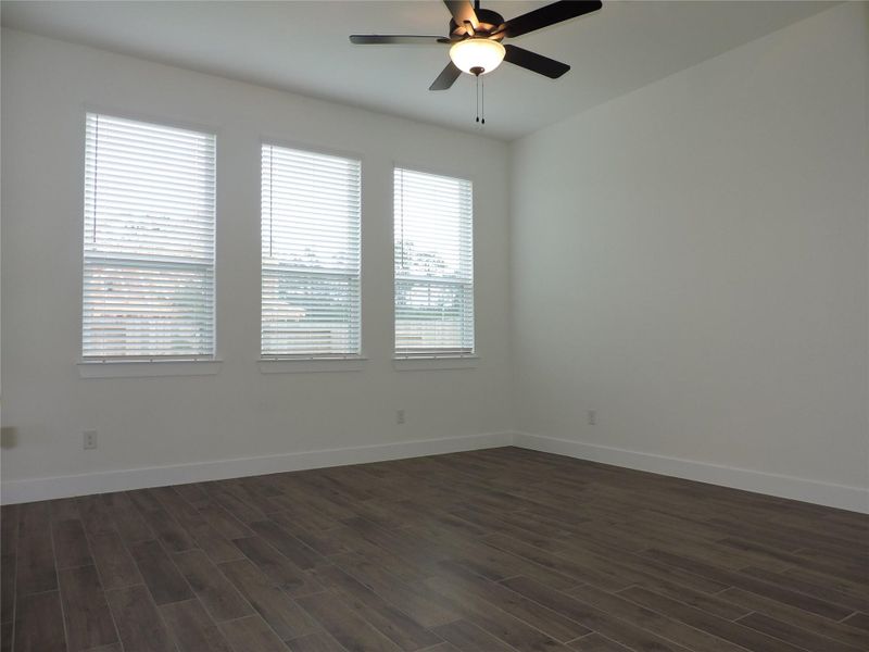 Ceiling fans and 2" Faux wood window coverings throughout the home.