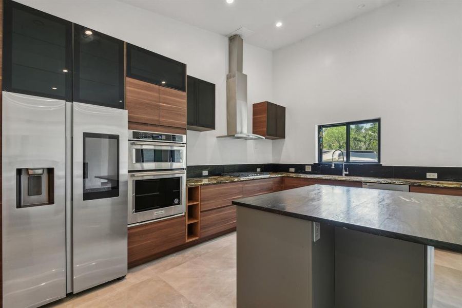 Chef's kitchen with gas cooktop.