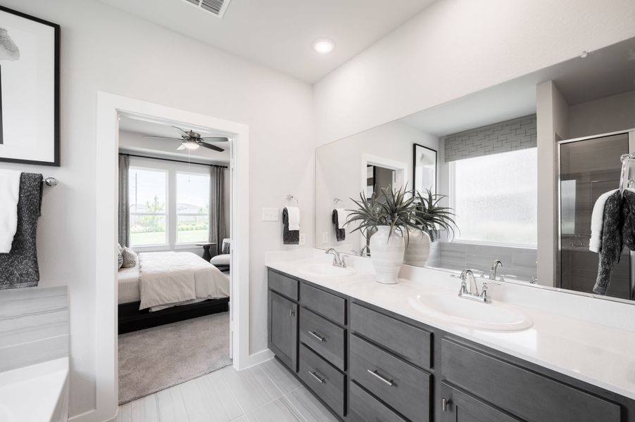 Representative furnished interior of a home built from the Yellowstar by Tri Pointe Homes in Mason Woods, Cypress (Image 37).