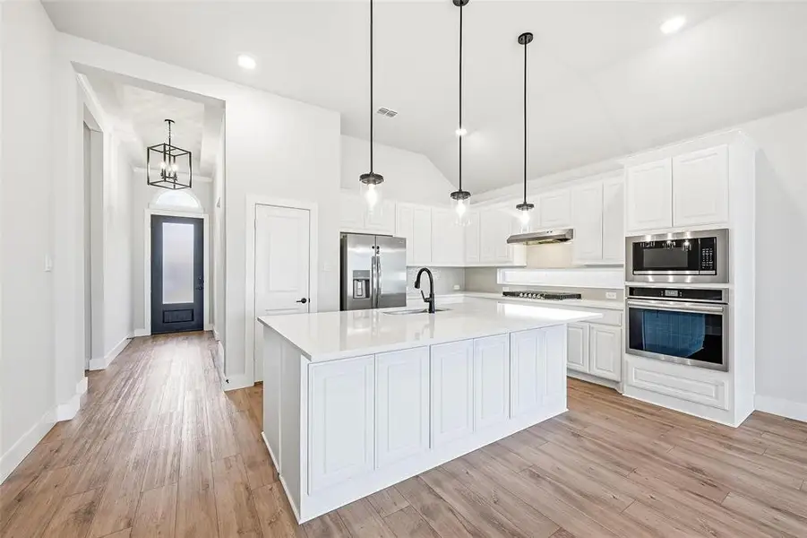 Furnished interior view inside a new home in , Little Elm (Image 4).