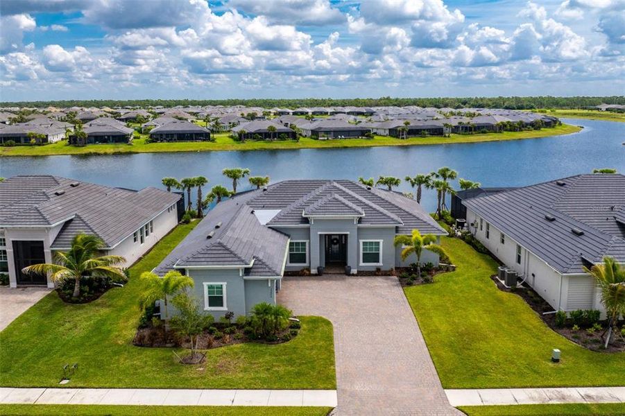 Front exterior of a new home in , Punta Gorda, FL, highlighting curb appeal (Image 2). Front exterior of a new home in , Punta Gorda, FL, highlighting curb appeal (Image 2).