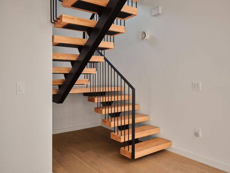 Stairway with wood finished floors