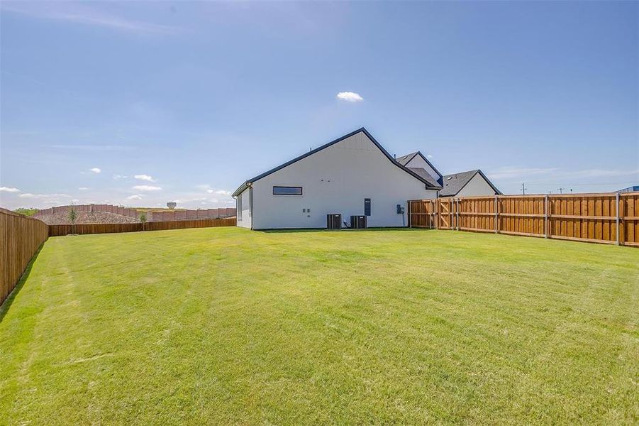 Exterior details and patio area of a home in Sweetgrass, Haslet (Image 2). Exterior details and patio area of a home in Sweetgrass, Haslet (Image 2).