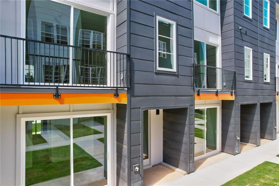 Front exterior of a new home in The Moderns at Sugar Creek Phase III, Atlanta, GA, highlighting curb appeal (Image 1).