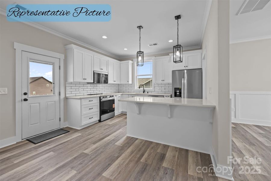 Furnished interior view inside a new home in , New London (Image 6). Furnished interior view inside a new home in , New London (Image 6).