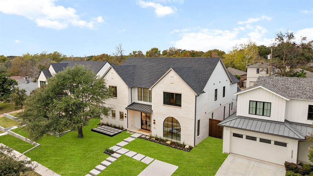 Front exterior of a new home in , Dallas, TX, highlighting curb appeal (Image 24).