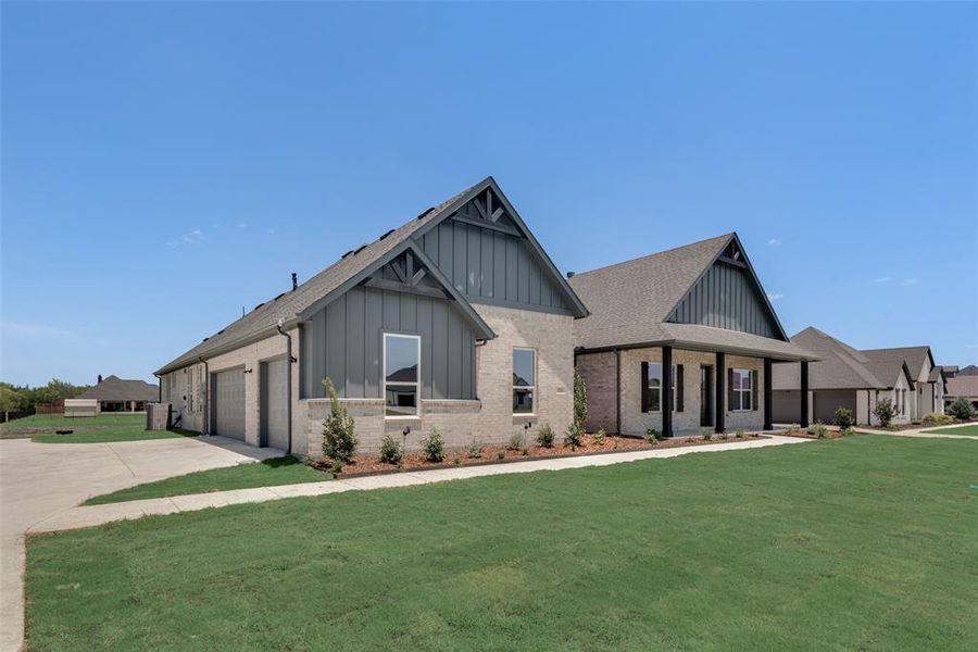 View of front of property with a front lawn