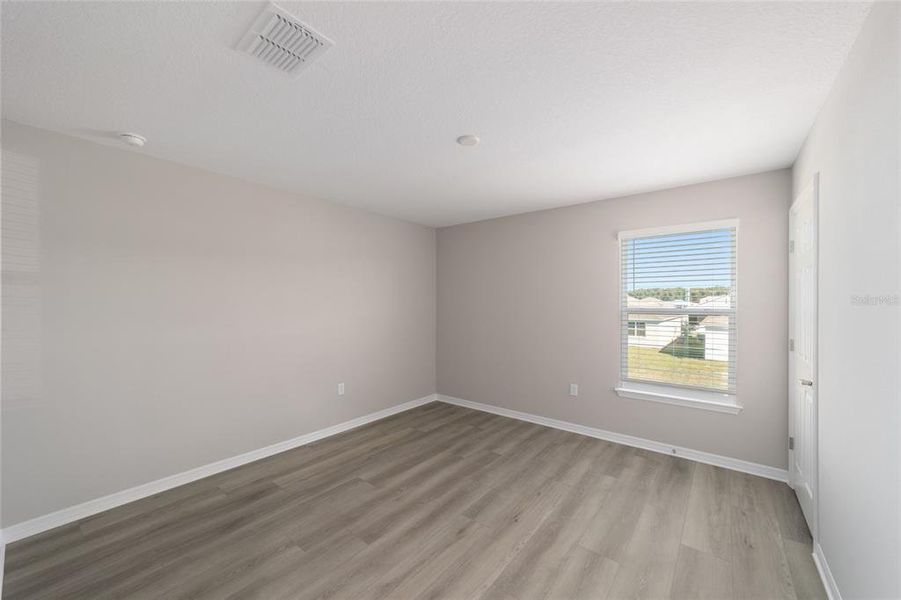 Spacious, unfurnished interior of a new home in Calesa Township, Ocala (Image 32).