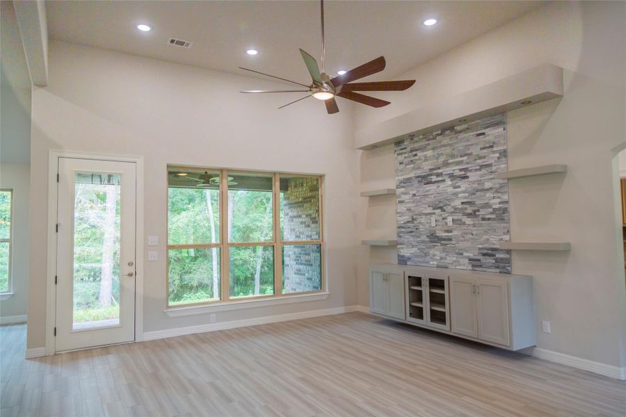 18x16 bright & open living area with an area for a fireplace if desired. 18x16 bright & open living area with an area for a fireplace if desired.