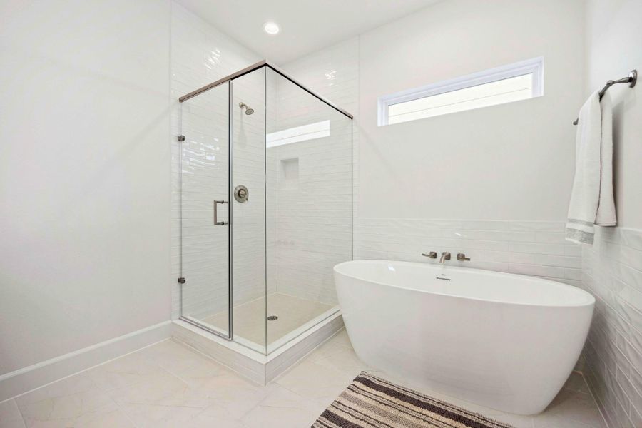 Steam it out or soak it in—this spa-like setup gives you both. Frameless glass, sculptural tub, and that “ahhh” factor. Steam it out or soak it in—this spa-like setup gives you both. Frameless glass, sculptural tub, and that “ahhh” factor.