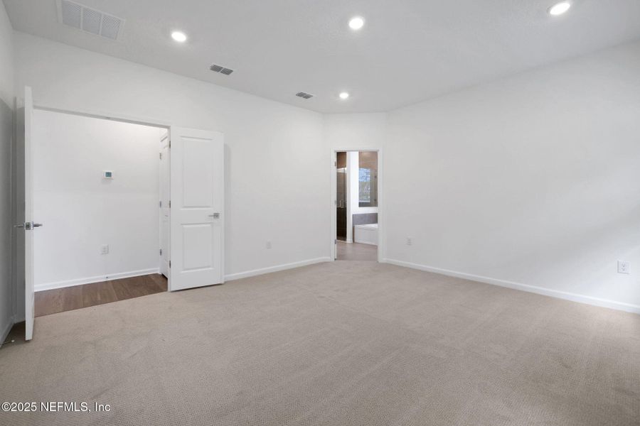 Spacious, unfurnished interior of a new home in Brook Forest, St. Augustine (Image 36).
