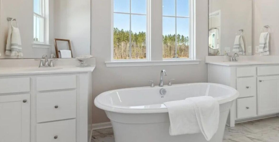 Furnished interior view inside a new home in Sweetgrass at Summers Corner, Summerville (Image 8).