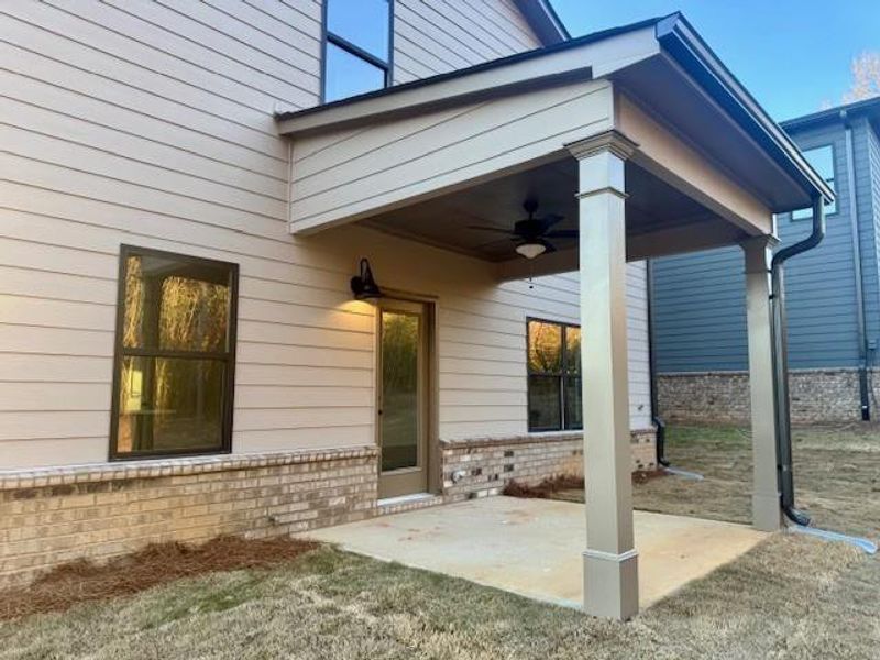 Exterior details and patio area of a home in Meadow Pines, Dallas (Image 20).