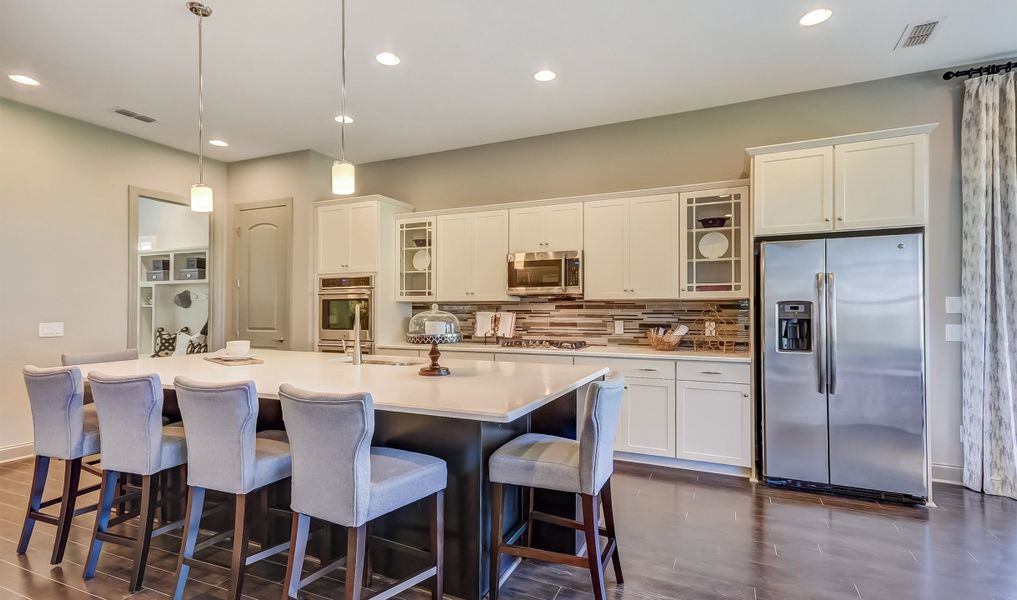 Breakfast bar at kitchen island Breakfast bar at kitchen island