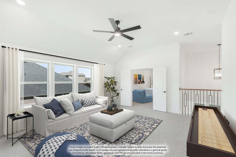 Upstairs game room with vaulted ceiling, ceiling fan, carpet, and shuffleboard table near staircase railing Upstairs game room with vaulted ceiling, ceiling fan, carpet, and shuffleboard table near staircase railing