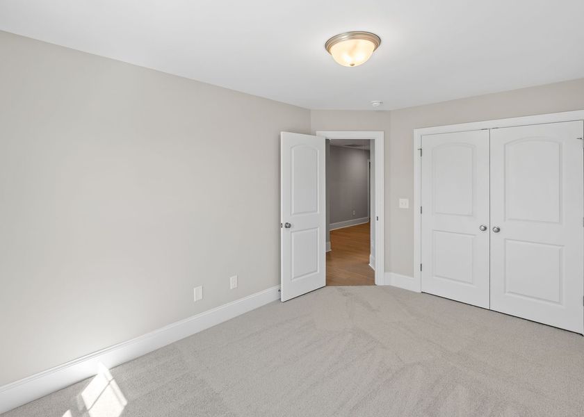 Spacious, unfurnished interior of a new home in Carolina Creek, Hampstead (Image 31).