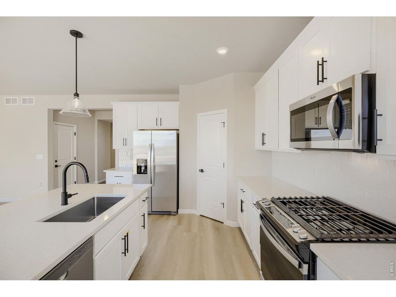 Furnished interior view inside a new home in Farmstead, Berthoud (Image 15).