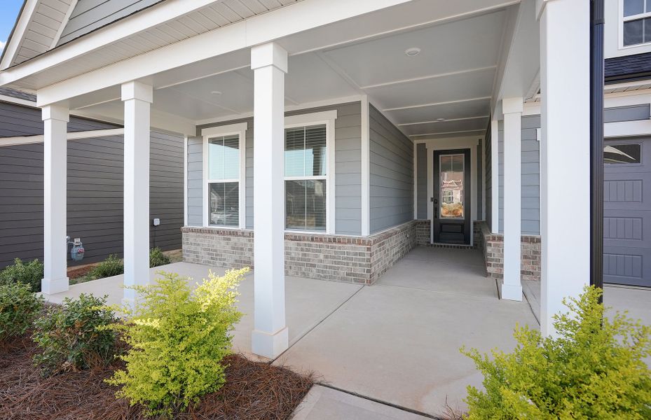 Exterior details and patio area of a home in Carolina Riverside, Belmont (Image 48).
