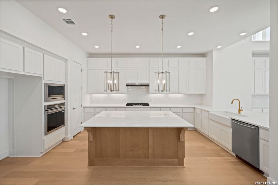 Furnished interior view inside a new home in Davis Ranch, San Antonio (Image 9).