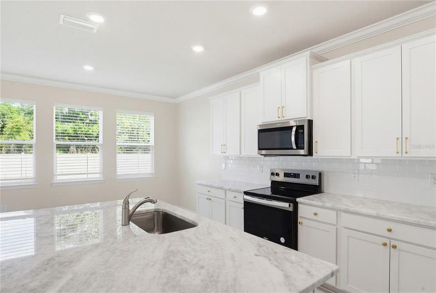 Furnished interior view inside a new home in Coddington, Bradenton (Image 11).