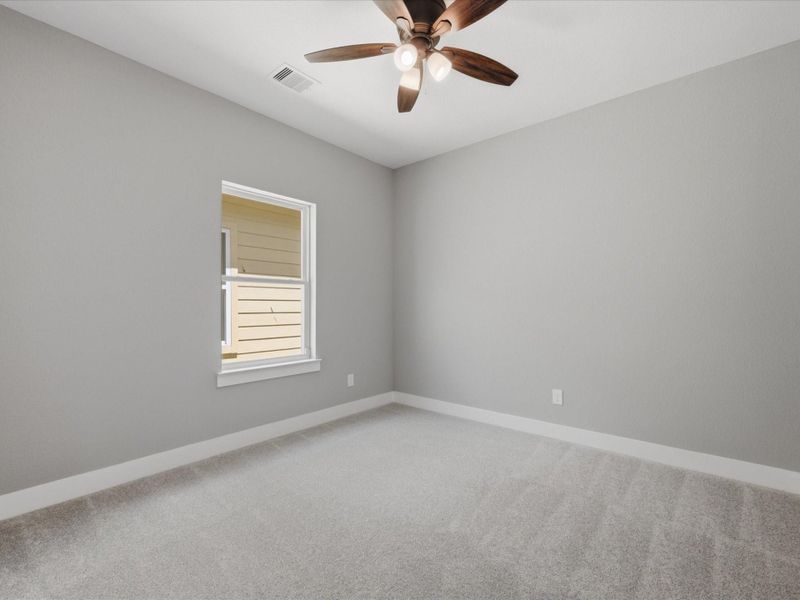 Bright and versatile, this secondary bedroom is perfectly positioned for everyday living or hosting guests. Bright and versatile, this secondary bedroom is perfectly positioned for everyday living or hosting guests.
