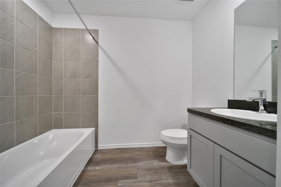 Furnished interior view inside a new home in Breckenridge Forest, Spring (Image 7).