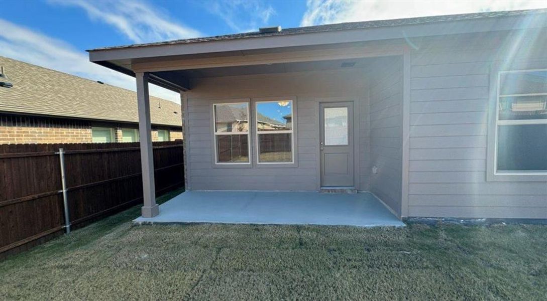 Exterior details and patio area of a home in Monarch at the Meadows, Denton (Image 3).