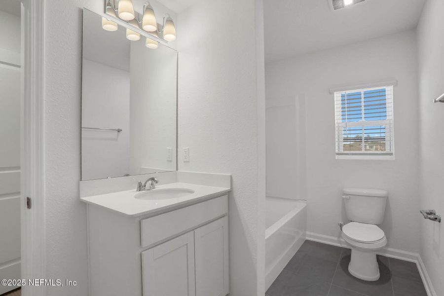 Furnished interior view inside a new home in Cordova Palms, St. Augustine (Image 11).